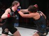 Katharina Lehner punching Sarah Kaufman at Invicta FC 29 by Dave Mandel