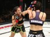 Kinberly Novaes punching Heather Jo Clark at Invicta FC 30 by Dave Mandel