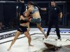 Lindsey VanZandt flying knee on Kelly D'Angelo at Invicta FC 31 by Dave Mandel