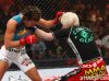 Maiju Kujala punching Miesha Tate at Strikeforce Challengers 10 by Esther Lin