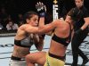 Mara Borella punching Taila Santos at UFC on ESPN+ 2 from UFC Facebook
