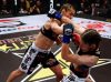 Marloes Coenen punching Liz Carmouche at Strikeforce 3-5-11 by Esther Lin