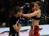 Marloes Coenen punching Roxanne Modafferi by Esther Lin for Strikeforce 11-9-2009