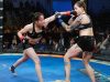 Melissa Martinez punching Ivanna Martinenghi opponent at Combat Americas