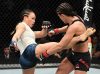 Michelle Waterson kicking Karolina Kowalkiewicz at UFC on ESPN 2 from UFC Facebook