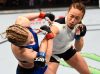 Michelle Waterson punching Paige VanZant at UFC on Fox 22 from UFC Facebook