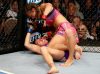 Miesha Tate punching Cat Zingano at TUF 17 Finale from UFC Facebook