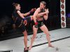 Mitzi Merry kicking Chelsea Chandler at Invicta FC 32 by Dave Mandel