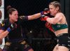 Mitzi Merry punching Chelsea Chandler at Invicta FC 32 by Dave Mandel