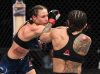 Nina Ansaroff punching Claudia Gadelha at UFC 231 from UFC Facebook