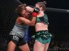 Pam Sorenson elbowing Felicia Spencer at Invicta FC 32 by Dave Mandel