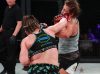 Pam Sorenson punching Felicia Spencer at Invicta FC 32 by Dave Mandel