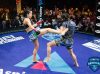 Paulina Granados kicking Stephanie Alba at Combate Americas 7