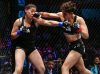 Paulina Vargas punching Erendira Ordonez at Combate Americas 32