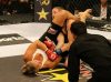 Ronda Rousey armbars Sarah D'Alelio at Strikeforce Challengers 18 by Kari Hubert