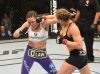 Ronda Rousey punching Alexis Davis at UFC 175 from UFC Facebook