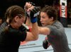 Sara McMann punching Lauren Murphy at UFC Fight Night 47 from UFC Facebook