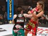 Sarah Kaufman punching Marloes Coenen at Strikeforce 10-9-10 by Esther Lin