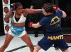 Viviane Pereira punching Mizuki Inoue at Invicta FC 32 by Dave Mandel
