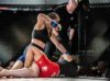 Laurynn Garcia punching Janetti Delgado at Epic 48 by MMAStalker